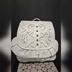 Stylish white leather backpack, new without tags, measures 14" tall  x 13" wide